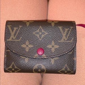 Louis Vuitton coin wallet.